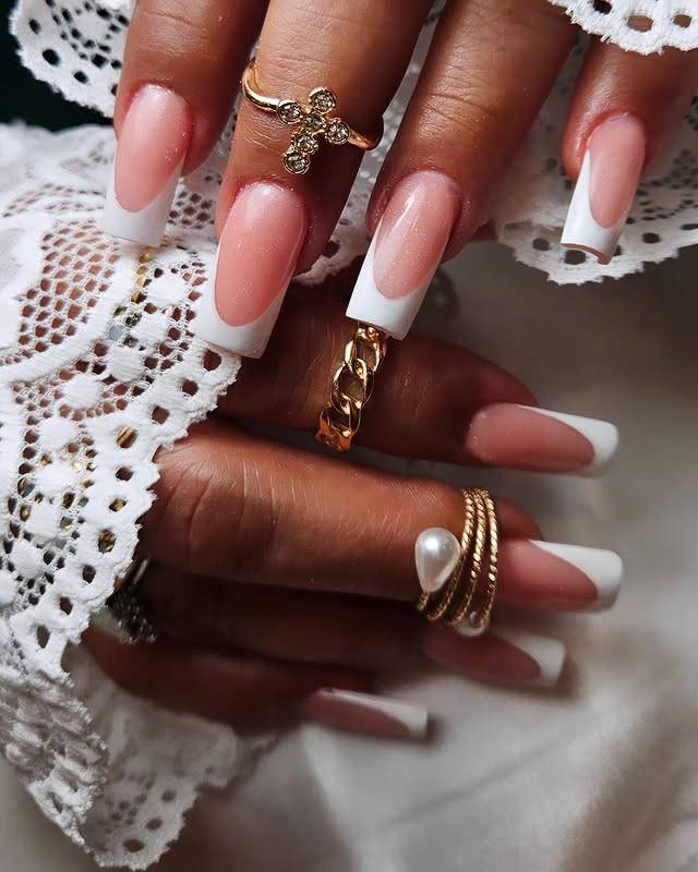 Radiant nail enhancements with delicate glitter highlights