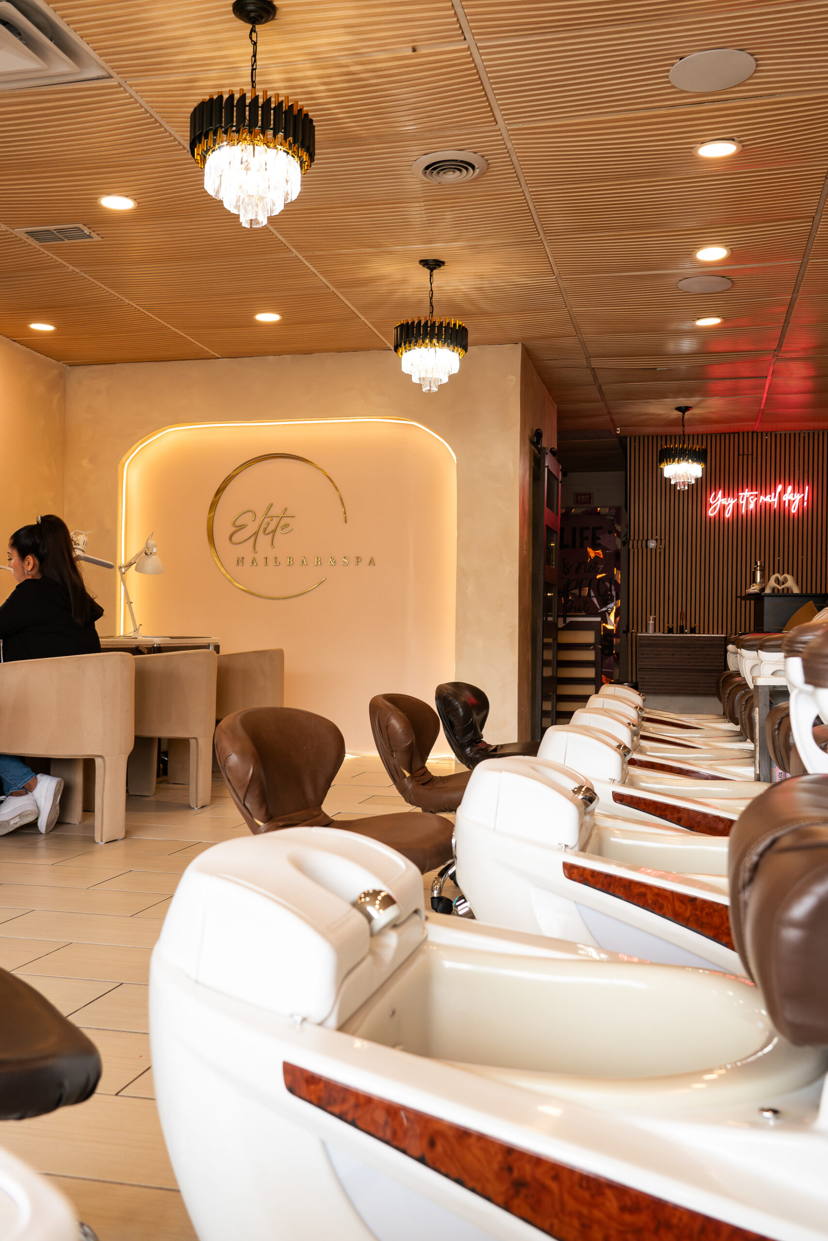 Dedicated spa pedicure station featuring herbal foot soaks and steaming warm towels